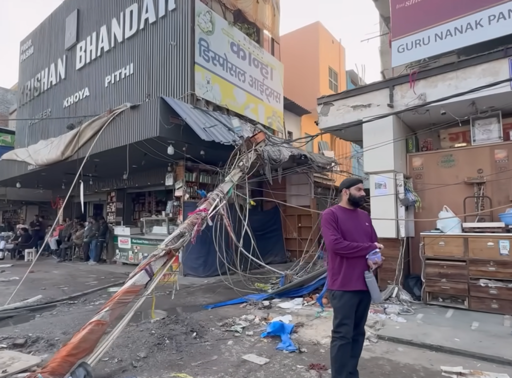 MCD Bulldozer Drive in Delhi’s Janakpuri Market Sparks Chaos; Electricity Poles Collapse, Traders Allege ‘No Notice’ MCD Bulldozer Drive in Delhi’s Janakpuri Market Sparks Chaos; Electricity Poles Collapse, Traders Allege ‘No Notice’