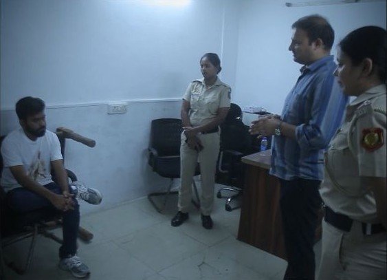 Delhi Police Says Dipke Declined Family Calls; He Alleges Phone and Lawyer Access Denied Abhijeet Dipke seated with police personnel in footage released by Delhi Police