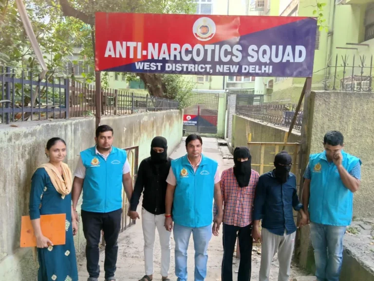 West District Anti-Narcotics Squad with three masked men in a photograph shared by Chandan Kumar