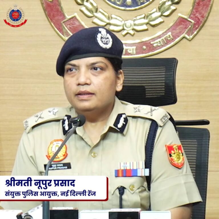 Delhi Police Joint Commissioner Nupur Prasad at a microphone in the official Operation CyHawk 6.0 video