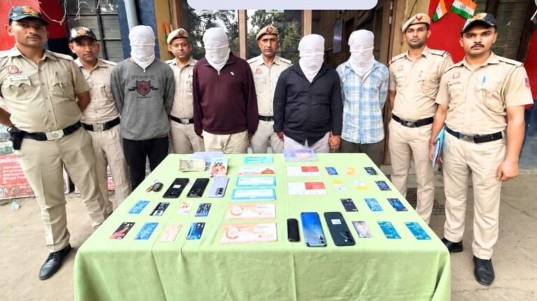 Five arrested in Delhi gift-parcel cyber fraud case; ₹43,000 recovered Delhi Police officers and four face-covered men with seized phones, SIM cards, ATM cards and cash