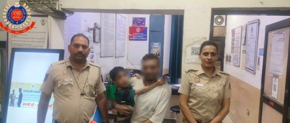 Missing Six-Year-Old Reunited With Father in 50 Minutes in Hauz Qazi Hauz Qazi police with the reunited child and family member, faces blurred in the original photograph