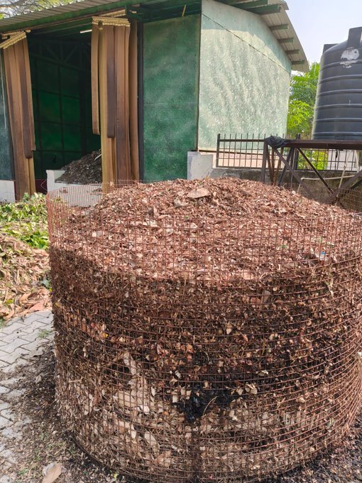 Compost held in a wire-mesh enclosure at the NDMC site identified as the Sangli Mess Composting Plant.
