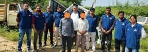 CCTV, UPI and WhatsApp Trail Leads Delhi Police to Punjab Truck-Dismantling Godown North Delhi police personnel with two people whose faces are obscured in the original photograph, near trucks and vehicle parts